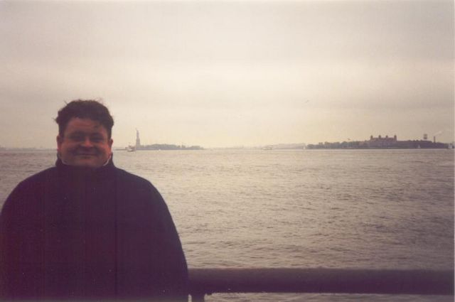 Keith with Ellis Island in the background